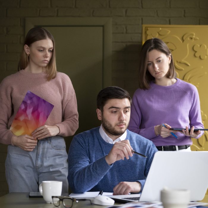colleagues-standing-together-medium-shot